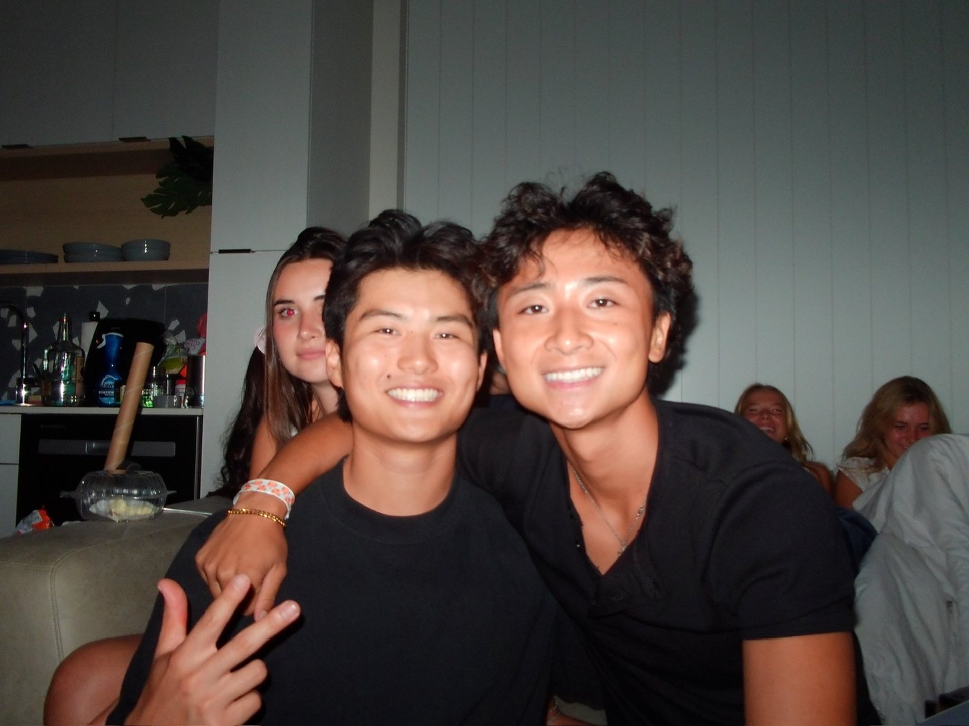Two friends, flash photograph at night